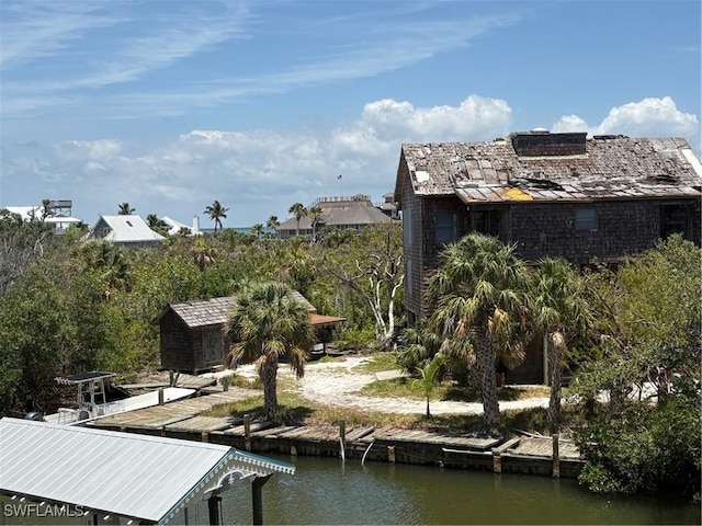 310 Pieces Of Eight, Captiva, FL 33924 - dock featuring a water view