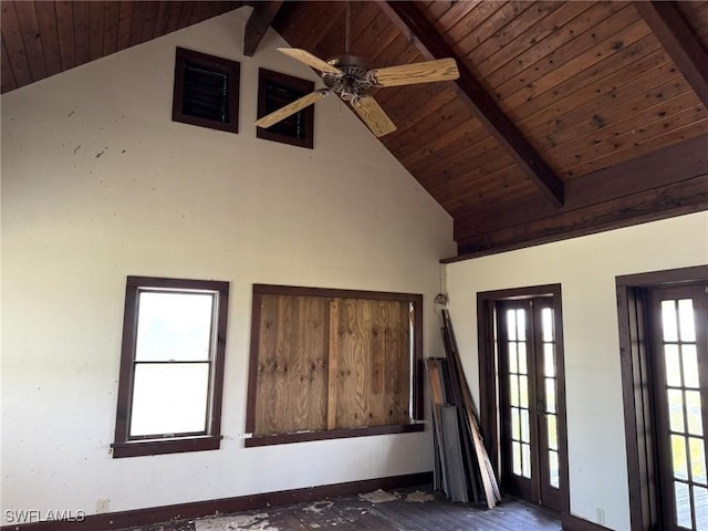 310 Pieces Of Eight, Captiva, FL 33924 - foyer entrance featuring high vaulted ceiling, wood ceiling with exposed beams, a ceiling fan, and french doors
