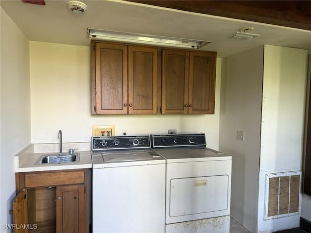 310 Pieces Of Eight, Captiva, FL 33924 - laundry room featuring cabinet space and washing machine and dryer