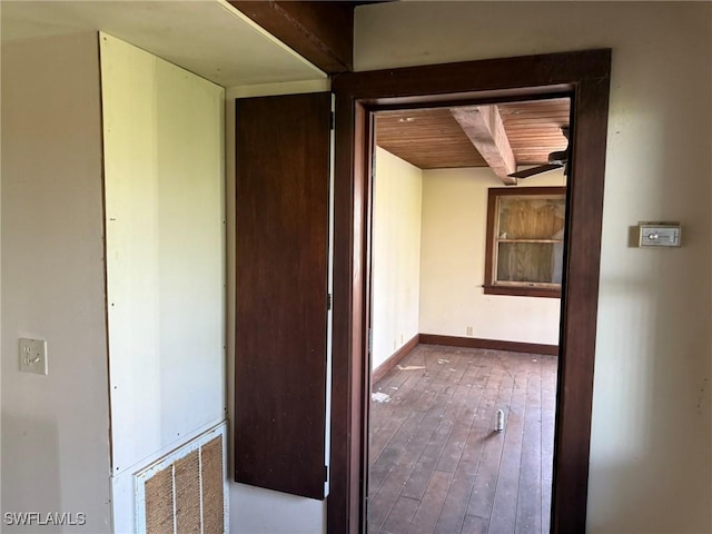 310 Pieces Of Eight, Captiva, FL 33924 - corridor with wood-type flooring and wood ceiling with exposed beams