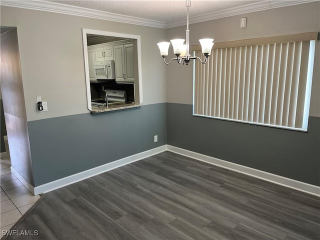 6184 Michelle Way Unit 123, Fort Myers, FL 33919 - unfurnished dining area featuring a chandelier, dark wood finished floors, baseboards, and ornamental molding