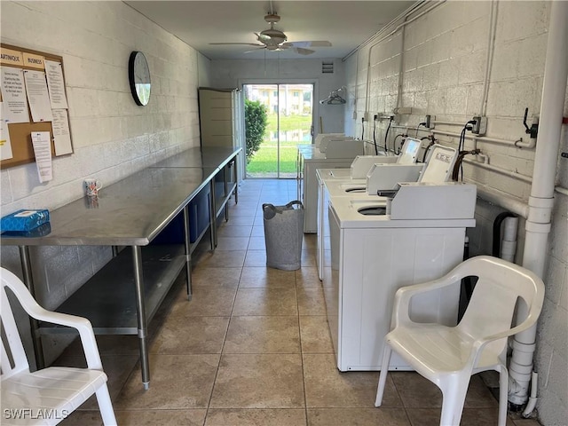 6184 Michelle Way Unit 123, Fort Myers, FL 33919 - kitchen with washer and clothes dryer, concrete block wall, a ceiling fan, and tile patterned flooring