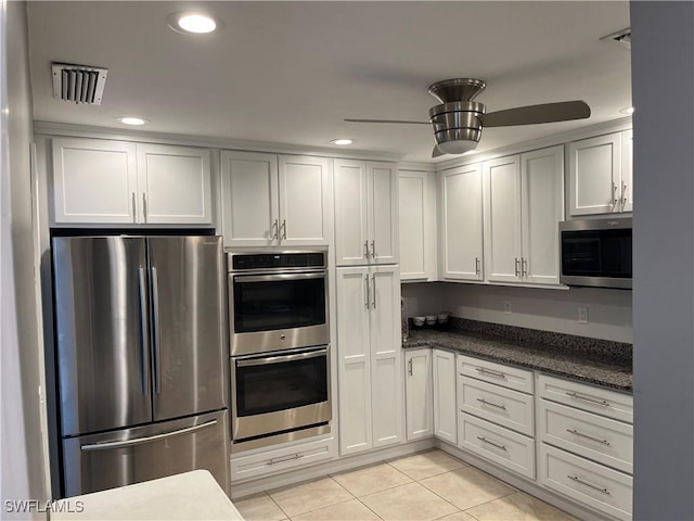6184 Michelle Way Unit 123, Fort Myers, FL 33919 - kitchen featuring appliances with stainless steel finishes, light tile patterned flooring, a ceiling fan, recessed lighting, and white cabinetry