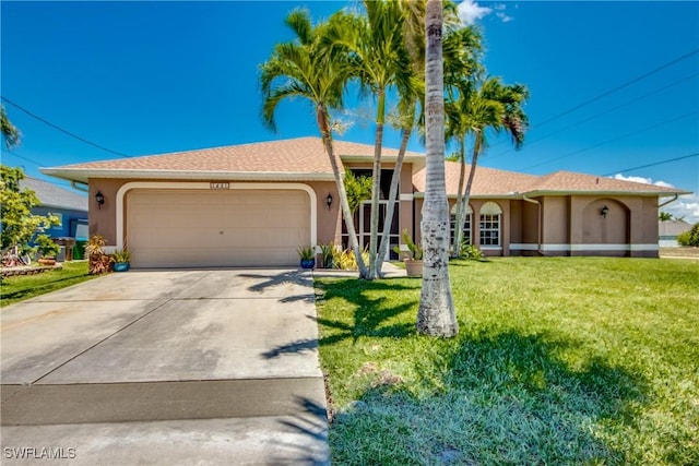1601 SW 19th St, Cape Coral, FL 33991 - single story home with stucco siding, a garage, a front yard, and driveway