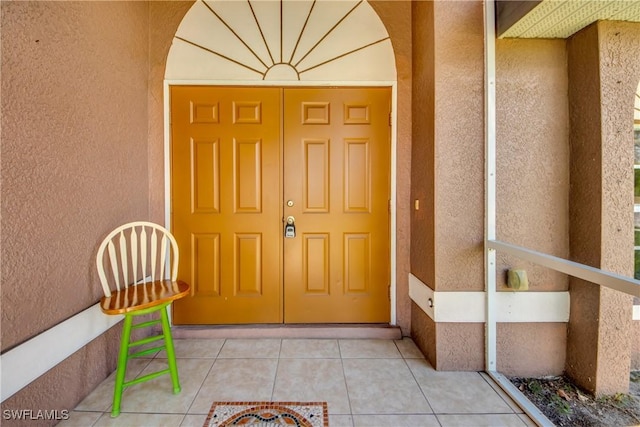 1601 SW 19th St, Cape Coral, FL 33991 - view of exterior entry with stucco siding