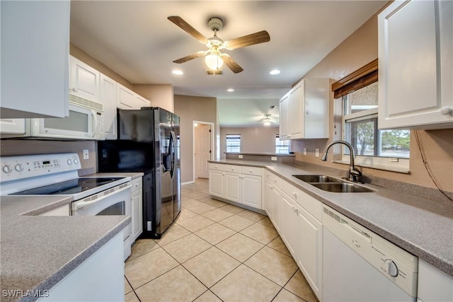 1601 SW 19th St, Cape Coral, FL 33991 - kitchen with white appliances, a sink, a ceiling fan, healthy amount of natural light, and recessed lighting