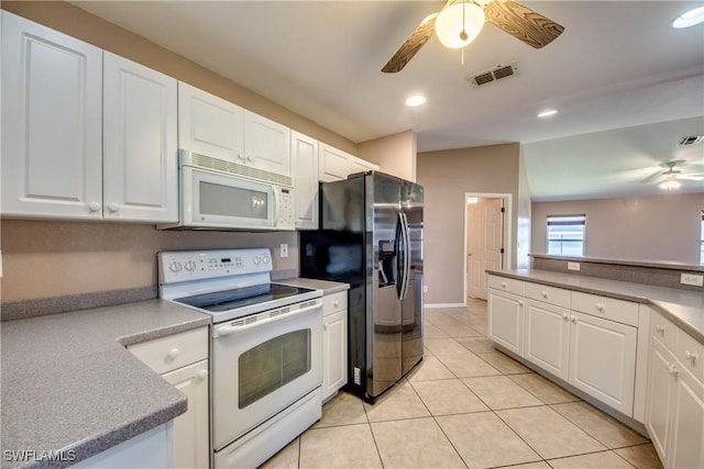 1601 SW 19th St, Cape Coral, FL 33991 - kitchen with white appliances, ceiling fan, white cabinetry, light tile patterned floors, and recessed lighting
