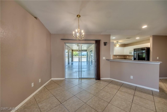 1601 SW 19th St, Cape Coral, FL 33991 - unfurnished dining area with a chandelier, light tile patterned floors, baseboards, and recessed lighting