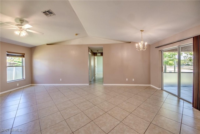 1601 SW 19th St, Cape Coral, FL 33991 - spare room with vaulted ceiling, a chandelier, light tile patterned floors, baseboards, and a ceiling fan