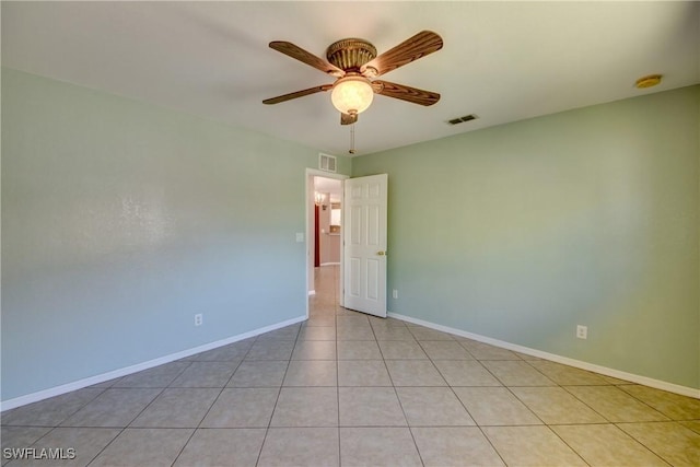 1601 SW 19th St, Cape Coral, FL 33991 - unfurnished room with ceiling fan, baseboards, a smoke detector, and tile patterned floors