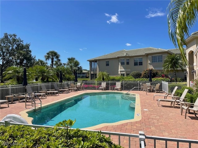650 Vintage Reserve Cir Unit 5C, Naples, FL 34119 - community pool with a patio