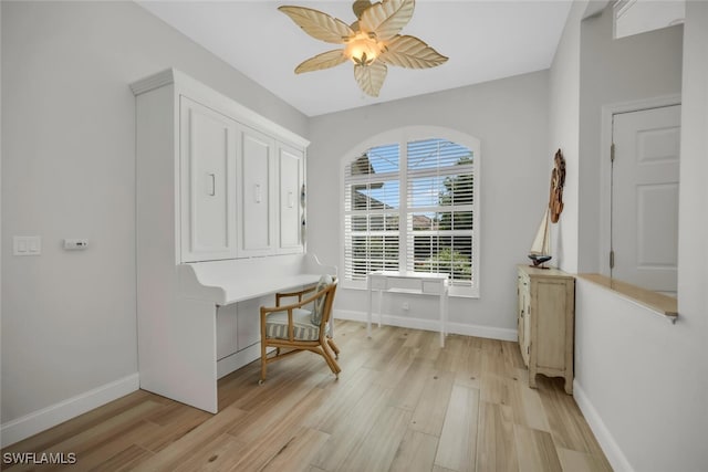28996 Seton Ct, Bonita Springs, FL 34134 - home office with light wood-style flooring, baseboards, and a ceiling fan