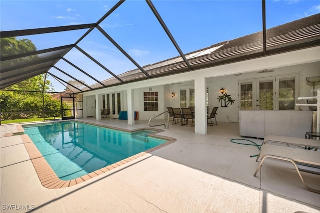 28996 Seton Ct, Bonita Springs, FL 34134 - swimming pool with french doors, a patio area, and a lanai