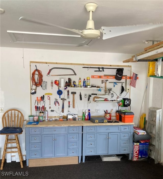 28996 Seton Ct, Bonita Springs, FL 34134 - miscellaneous room with a workshop area and attic access