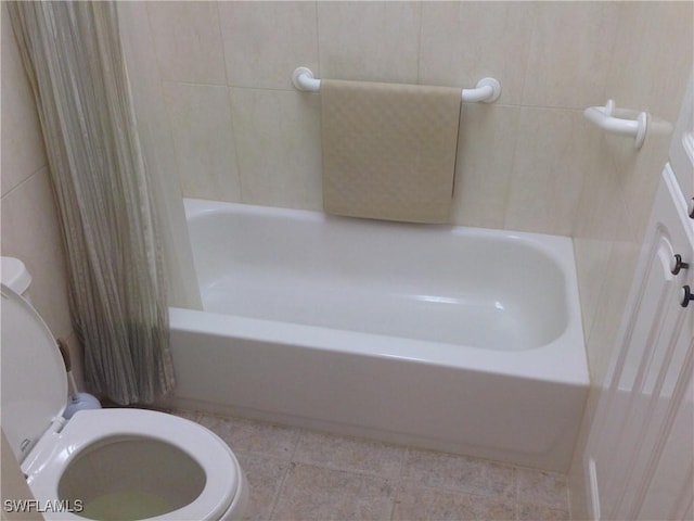 3760 Inverrary Dr Unit 1W, Lauderhill, FL 33319 - full bathroom with toilet, a tub to relax in, tile patterned floors, and a shower with shower curtain