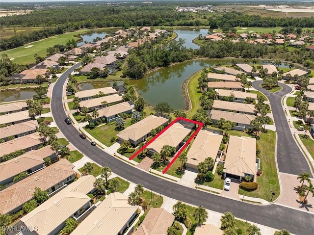 9327 Trieste Dr, Fort Myers, FL 33913 - aerial view of residential area featuring a large body of water, property boundaries highlighted, and a local golf course