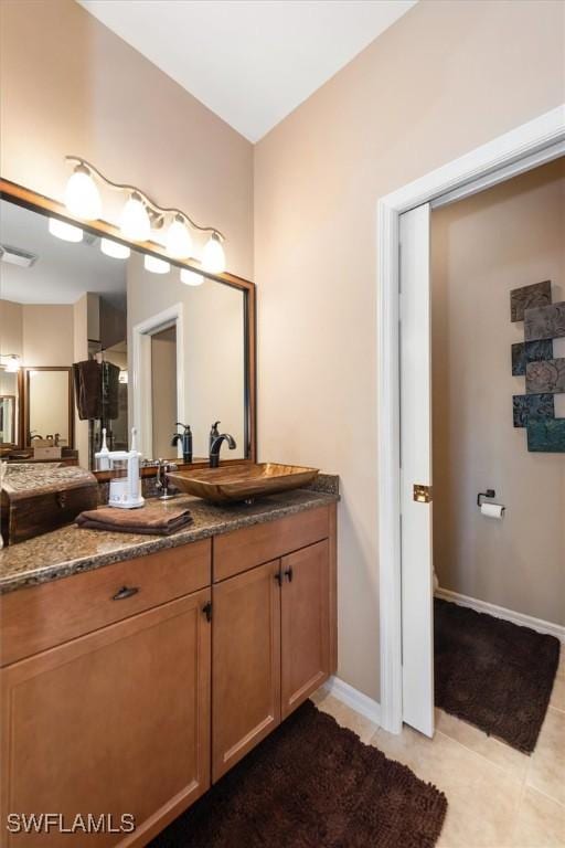 9327 Trieste Dr, Fort Myers, FL 33913 - bathroom with vanity and tile patterned floors