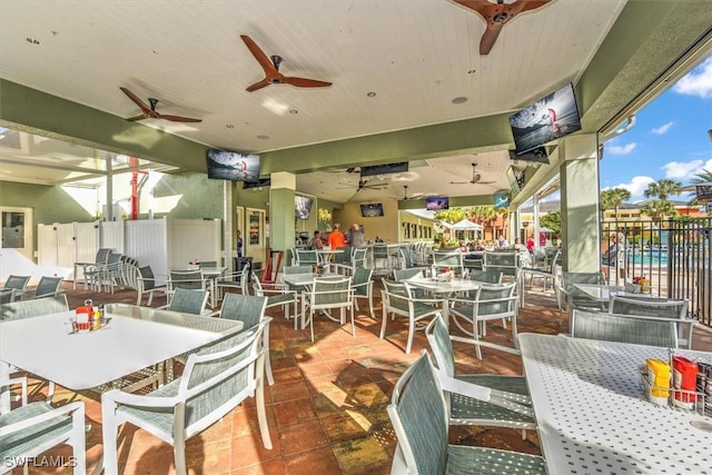 9327 Trieste Dr, Fort Myers, FL 33913 - dining space featuring ceiling fan and wooden ceiling