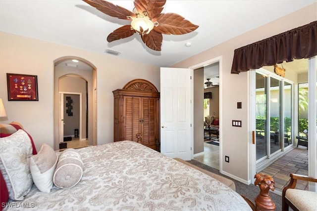 9327 Trieste Dr, Fort Myers, FL 33913 - bedroom with access to outside, arched walkways, baseboards, and a ceiling fan