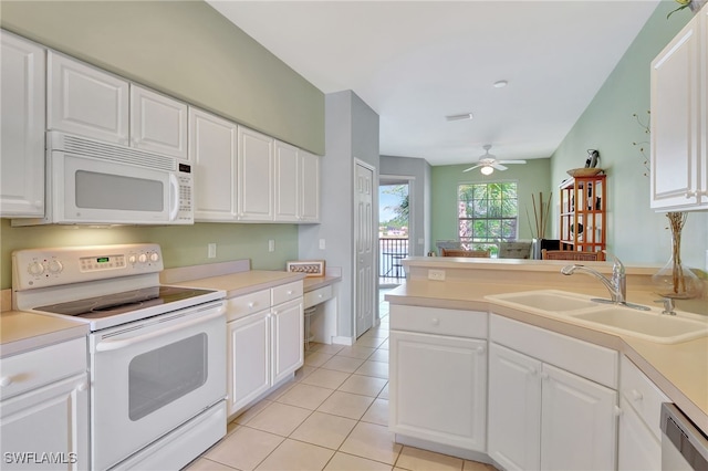 10020 Sky View Way Unit 905, Fort Myers, FL 33913 - kitchen featuring white appliances, a sink, light tile patterned flooring, light countertops, and white cabinetry