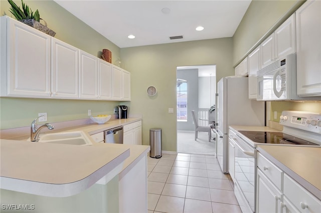 10020 Sky View Way Unit 905, Fort Myers, FL 33913 - kitchen featuring white appliances, a sink, light countertops, white cabinets, and recessed lighting