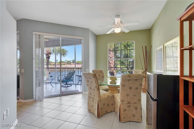 10020 Sky View Way Unit 905, Fort Myers, FL 33913 - dining area with a ceiling fan and light tile patterned flooring