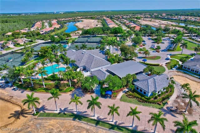 10020 Sky View Way Unit 905, Fort Myers, FL 33913 - aerial overview of property's location with a large body of water, nearby suburban area, and a pool