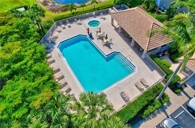 10020 Sky View Way Unit 905, Fort Myers, FL 33913 - community pool with a patio and a community hot tub