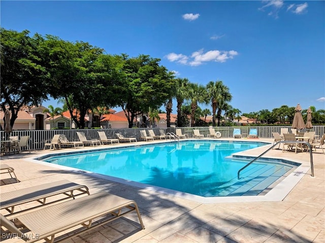 10020 Sky View Way Unit 905, Fort Myers, FL 33913 - community pool featuring a patio