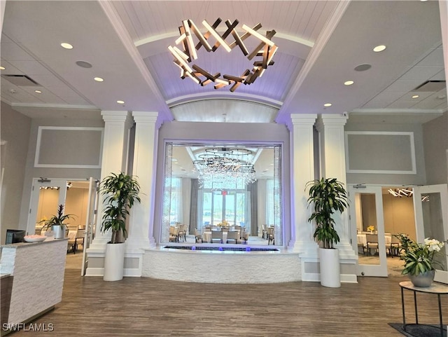 10020 Sky View Way Unit 905, Fort Myers, FL 33913 - common area featuring a towering ceiling, wood ceiling, recessed lighting, and ornamental molding
