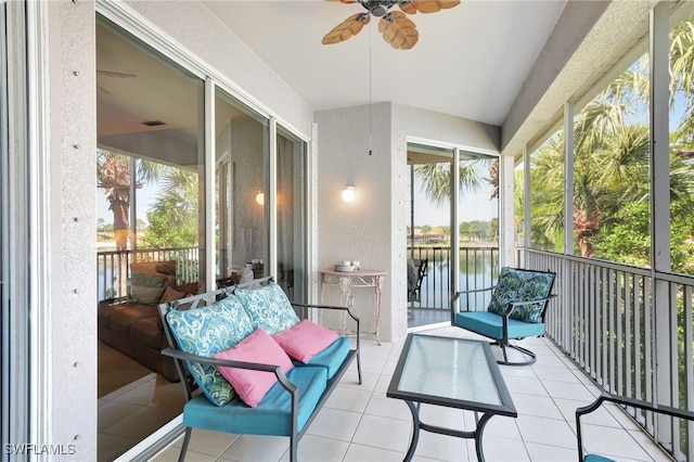 10020 Sky View Way Unit 905, Fort Myers, FL 33913 - sunroom featuring ceiling fan, healthy amount of natural light, and a water view