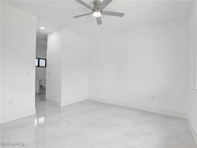 2933 20th St SW, Lehigh Acres, FL 33976 - spare room featuring ceiling fan and recessed lighting