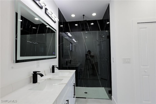 2933 20th St SW, Lehigh Acres, FL 33976 - full bath featuring a marble finish shower, double vanity, and recessed lighting