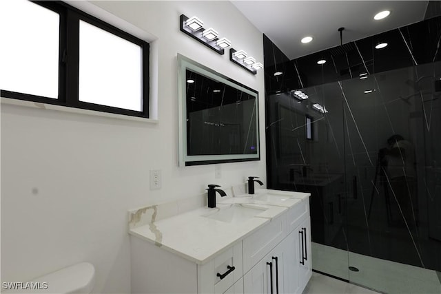 2933 20th St SW, Lehigh Acres, FL 33976 - bathroom featuring vanity, a marble finish shower, and recessed lighting