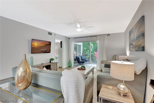 773 Wiggins Lake Dr Unit 101, Naples, FL 34110 - living room with a ceiling fan