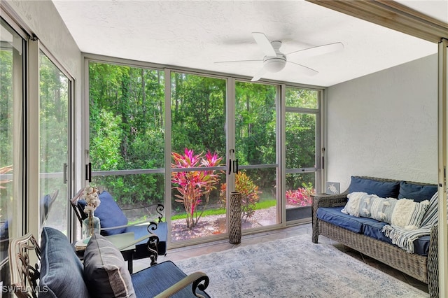 773 Wiggins Lake Dr Unit 101, Naples, FL 34110 - sunroom / solarium featuring ceiling fan and an outdoor living space
