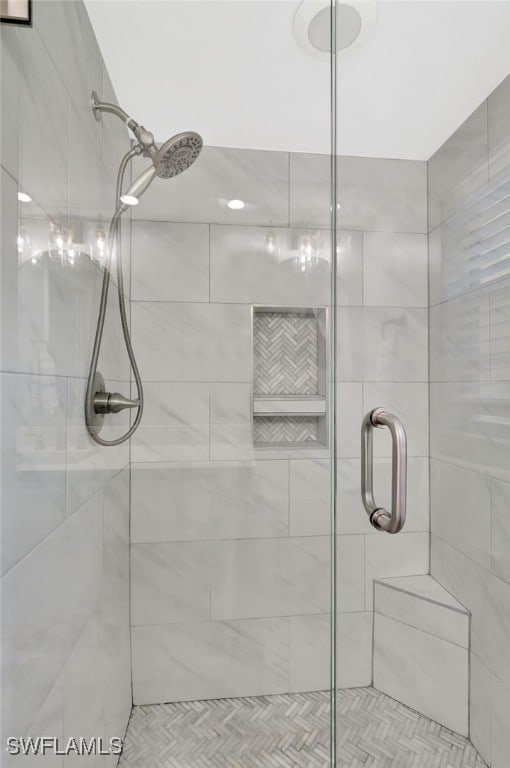 773 Wiggins Lake Dr Unit 101, Naples, FL 34110 - full bathroom featuring a shower stall