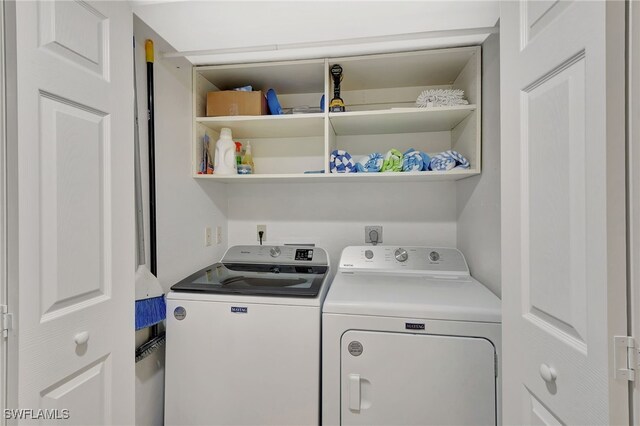 773 Wiggins Lake Dr Unit 101, Naples, FL 34110 - laundry room featuring washing machine and clothes dryer