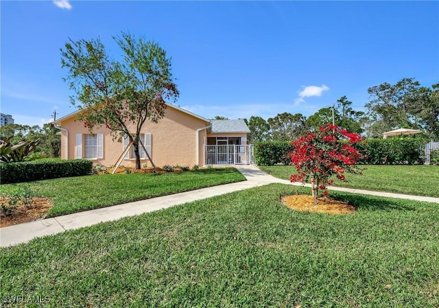 773 Wiggins Lake Dr Unit 101, Naples, FL 34110 - view of front of home featuring stucco siding
