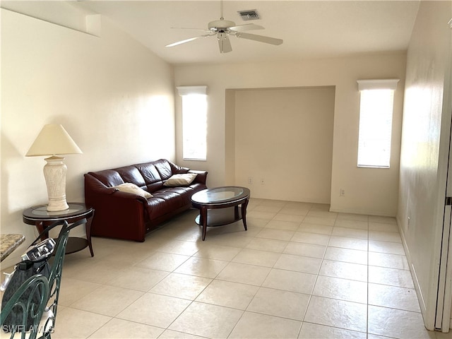 86 Pinehurst Pl, Rotonda West, FL 33947 - living area featuring a ceiling fan, light tile patterned flooring, and vaulted ceiling