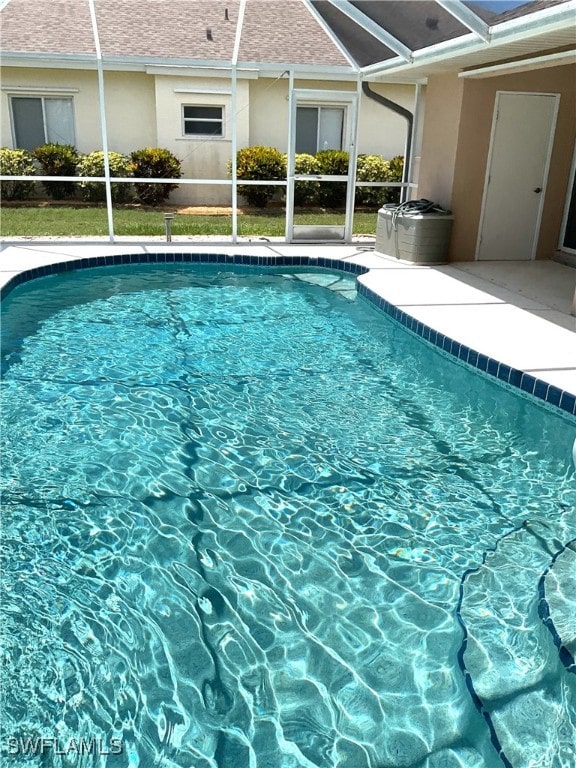 86 Pinehurst Pl, Rotonda West, FL 33947 - outdoor pool featuring a lanai and a patio