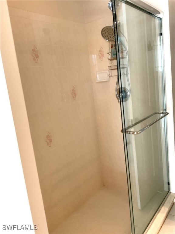 86 Pinehurst Pl, Rotonda West, FL 33947 - bathroom with a shower stall