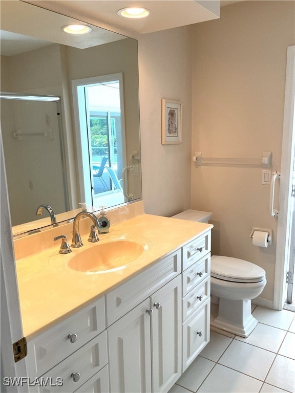 86 Pinehurst Pl, Rotonda West, FL 33947 - full bath with vanity, tile patterned flooring, toilet, and a shower stall