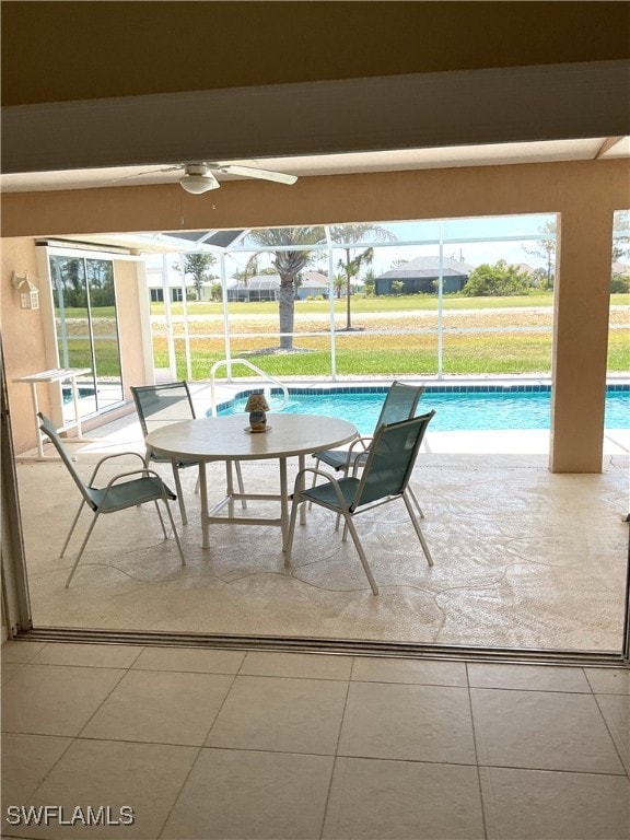 86 Pinehurst Pl, Rotonda West, FL 33947 - view of patio with a ceiling fan, an outdoor pool, and a lanai
