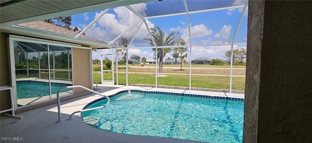 86 Pinehurst Pl, Rotonda West, FL 33947 - outdoor pool featuring a patio area, glass enclosure, and a yard