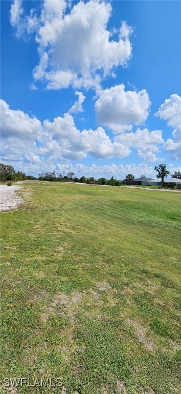 86 Pinehurst Pl, Rotonda West, FL 33947 - view of grassy yard featuring a view of rural / pastoral area