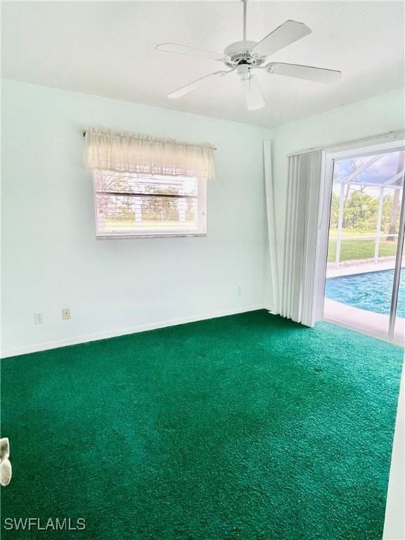 86 Pinehurst Pl, Rotonda West, FL 33947 - spare room featuring carpet flooring and ceiling fan