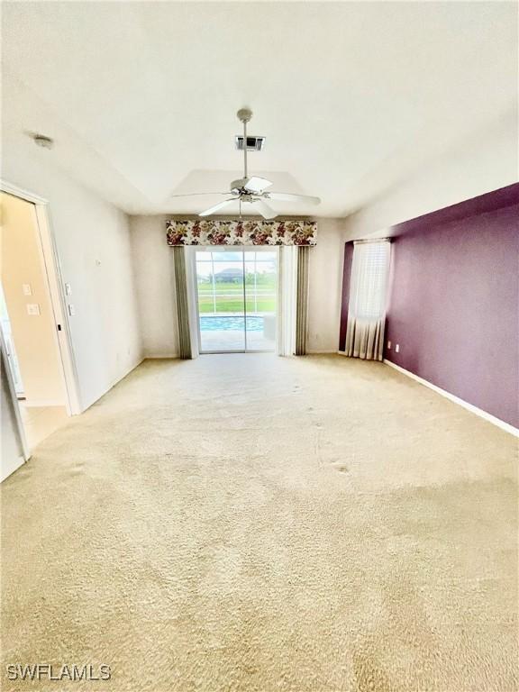 86 Pinehurst Pl, Rotonda West, FL 33947 - unfurnished room featuring ceiling fan and carpet flooring