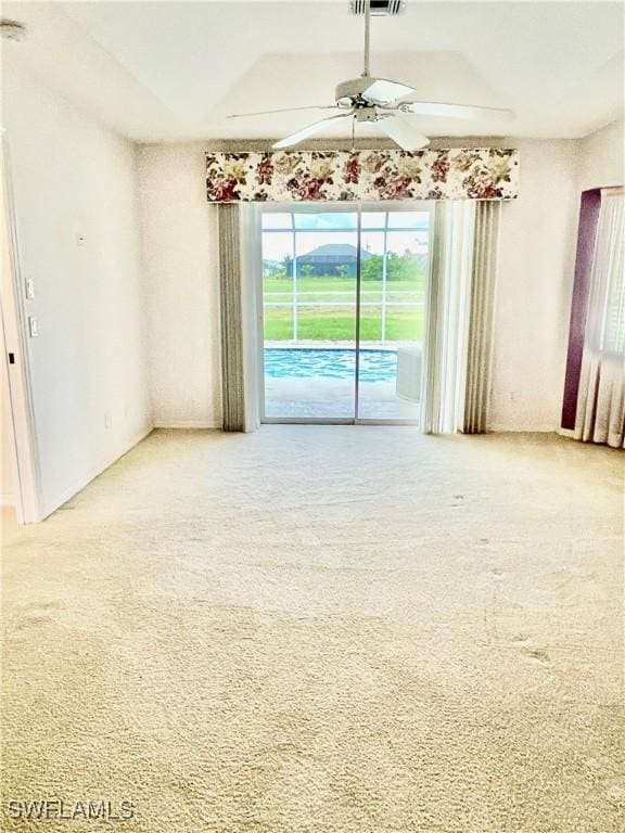 86 Pinehurst Pl, Rotonda West, FL 33947 - carpeted empty room featuring ceiling fan