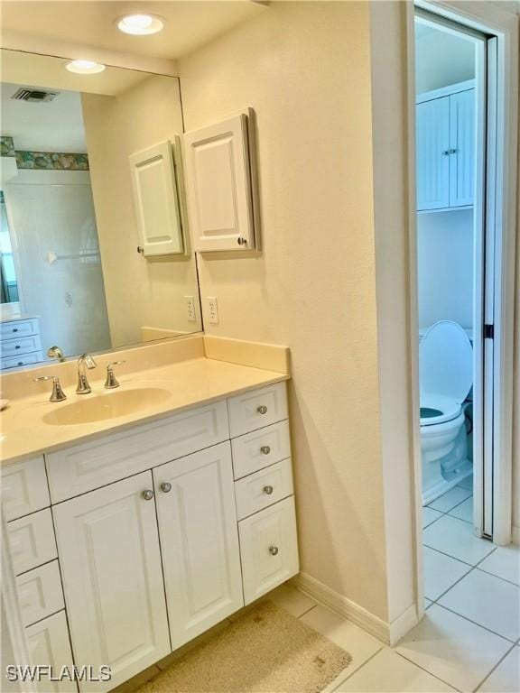 86 Pinehurst Pl, Rotonda West, FL 33947 - bathroom featuring tile patterned floors and vanity